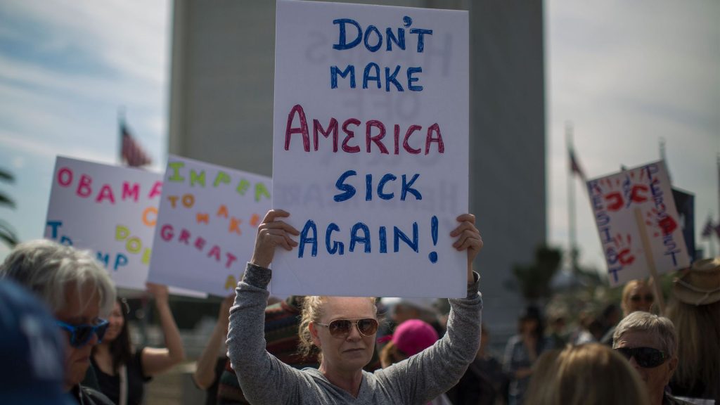 People protest Trump health care policies. Photo: David McNew/AFP/Getty Images